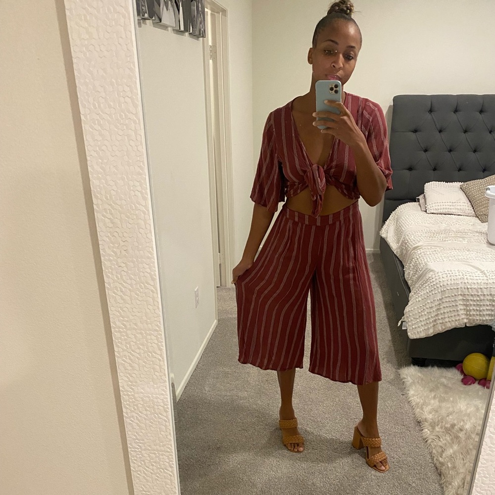 Two piece matching set. Top is a medium and bottoms are a small